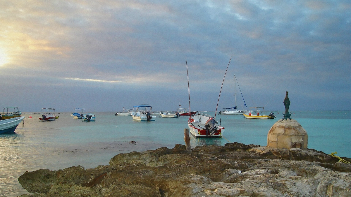 Beach and small boats at the Akumal bay entrance on the Riviera Maya coast of Mexico