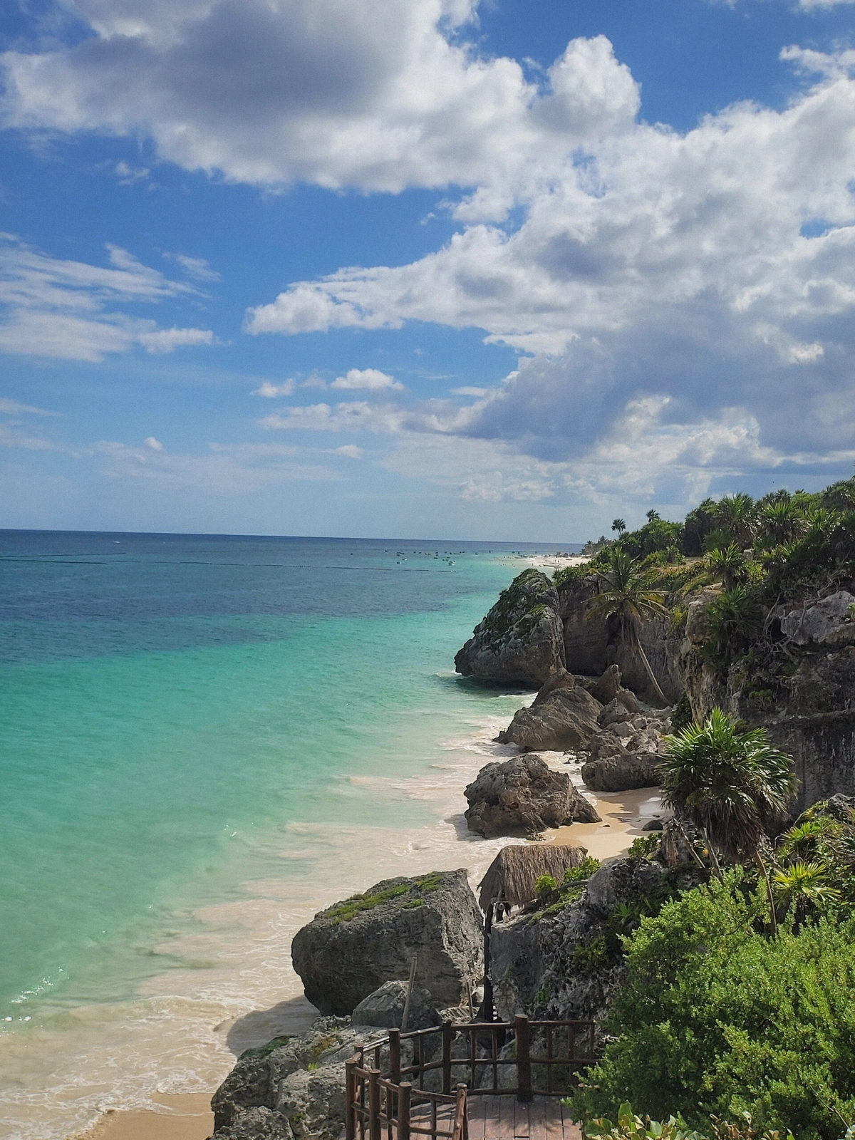 Coast at Tulum with the Mayan ruins standing above the Caribbean seen from the water